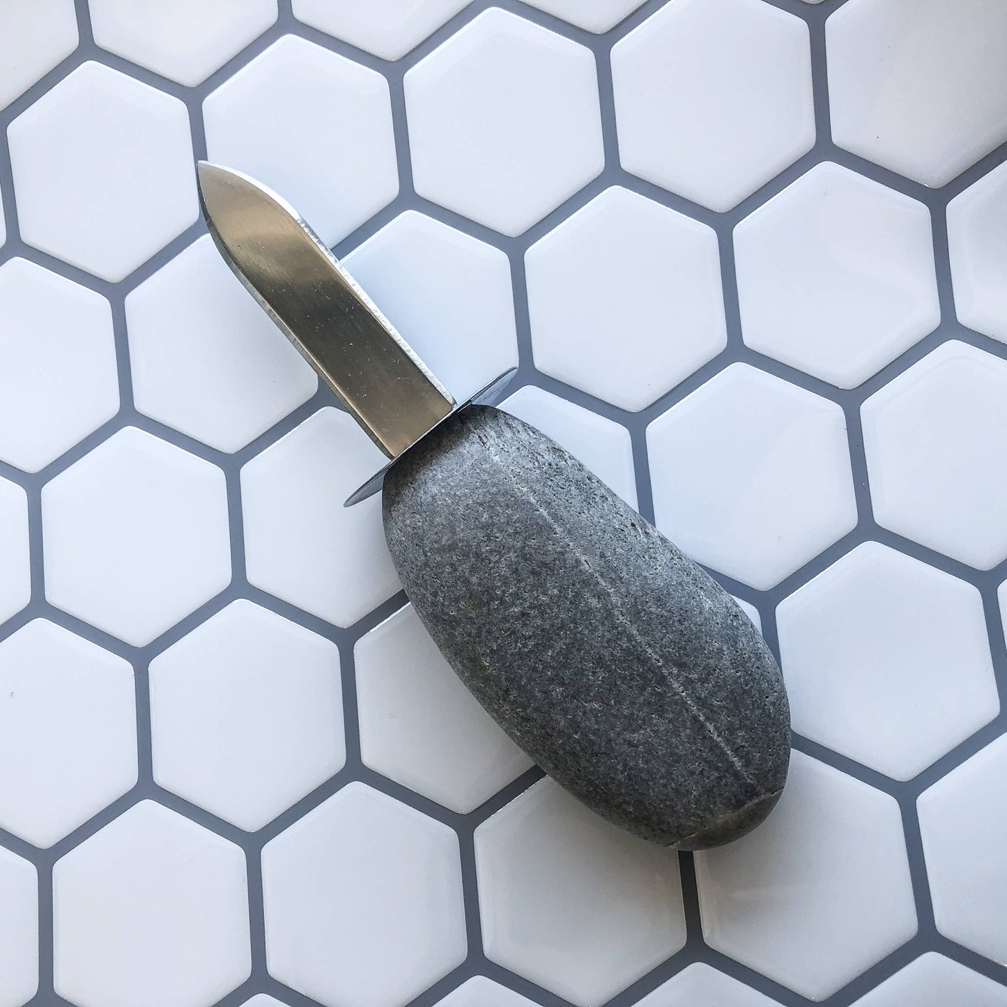 Stone Clam Shucker