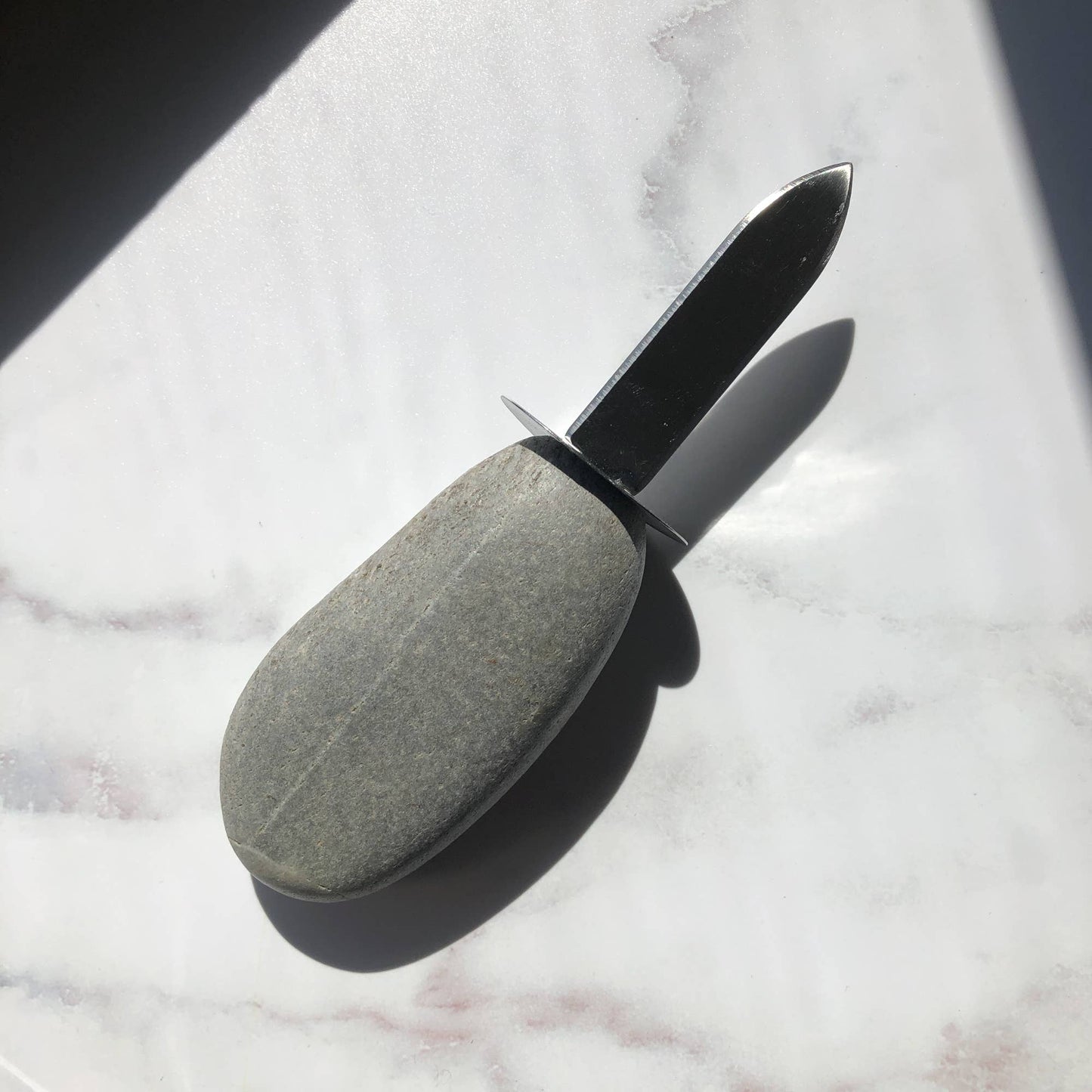Stone Clam Shucker
